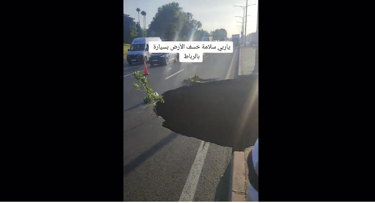 Rabat, trou, trou béant , gouffre, cônes de signalisation, automobilistes