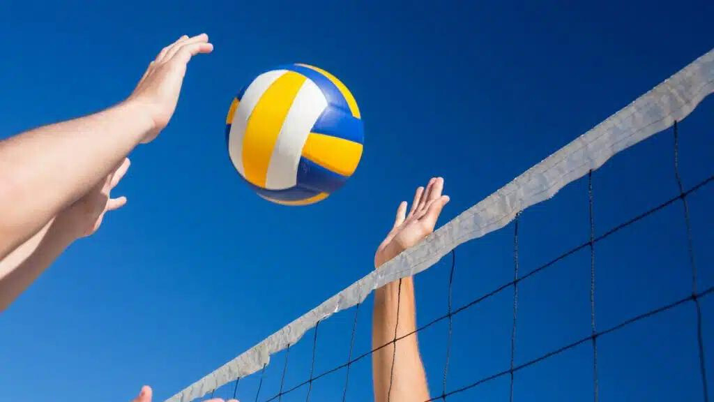 friends playing volleyball